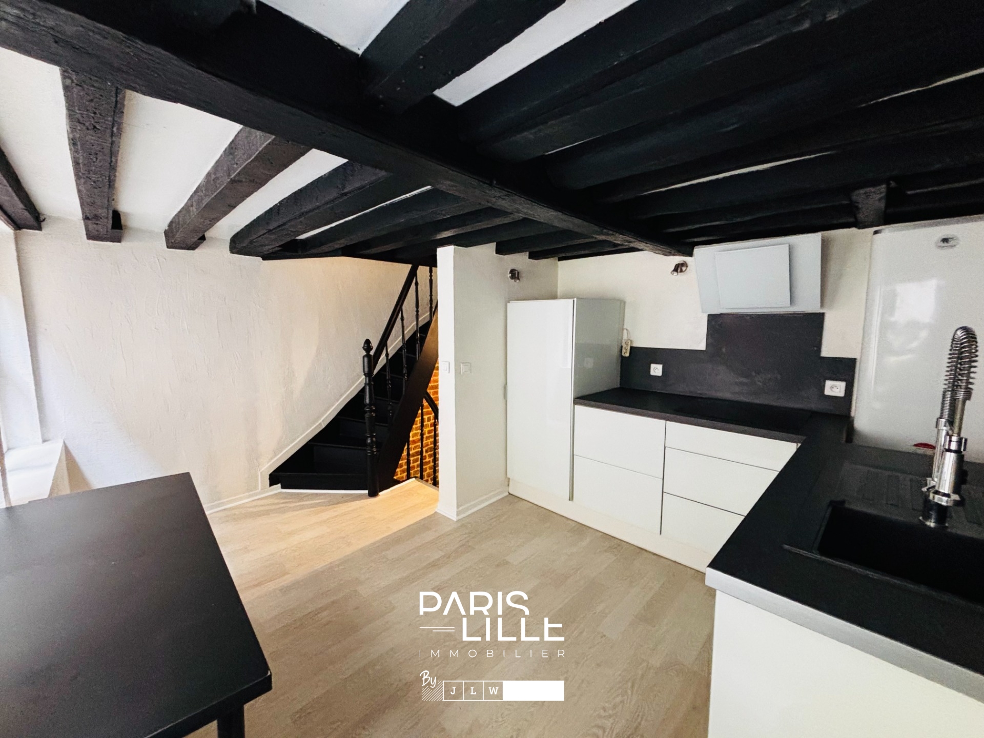 Appartement triplex au coeur du vieux lille Photo 1 - Paris Lille Immobilier