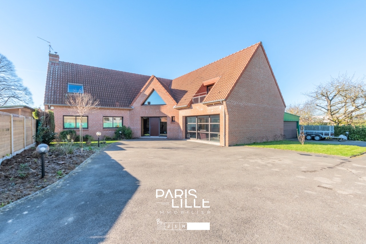 Grande maison individuelle grand garage Photo 1 - Paris Lille Immobilier
