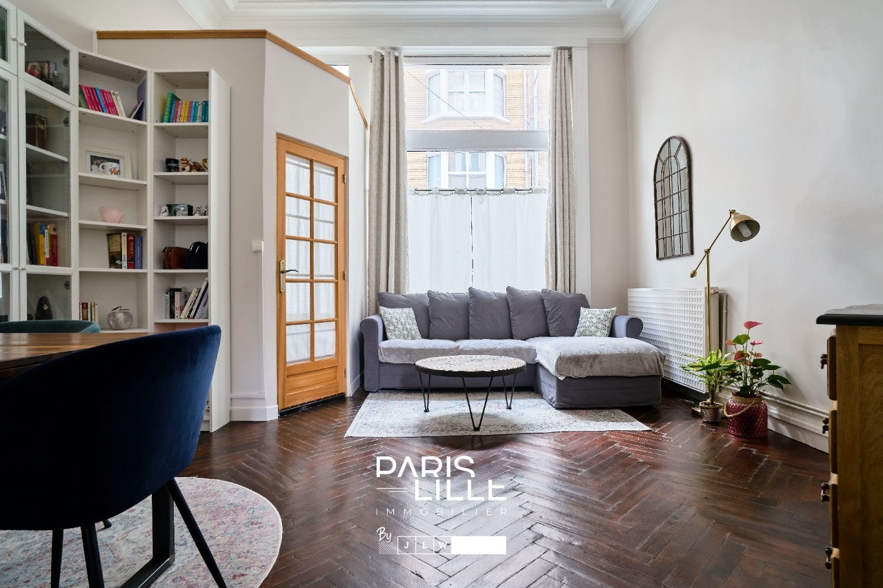 Appartement au cachet preserve Photo 2 - Paris Lille Immobilier