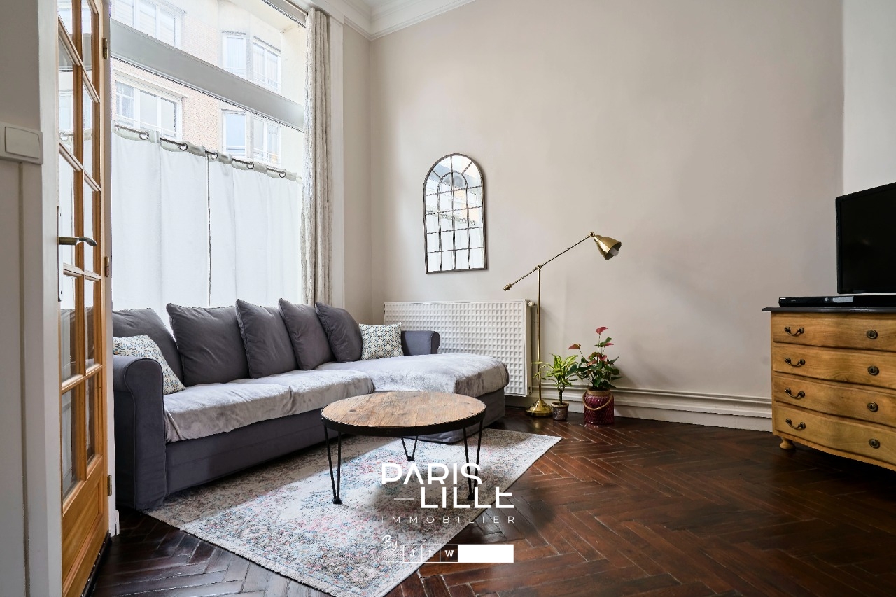 Appartement au cachet preserve Photo 3 - Paris Lille Immobilier