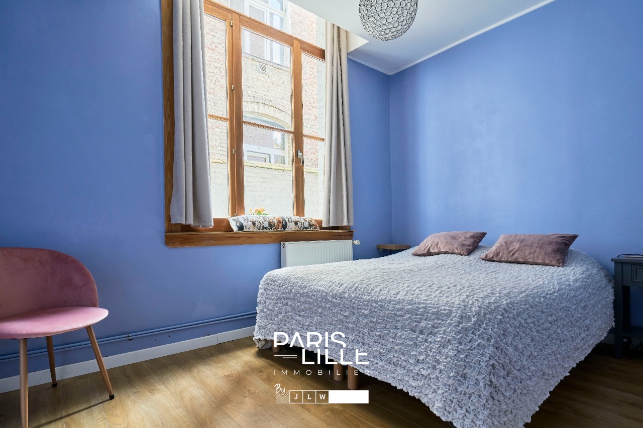 Appartement au cachet preserve Photo 4 - Paris Lille Immobilier