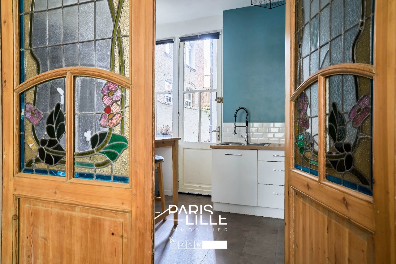 Appartement au cachet preserve Photo 5 - Paris Lille Immobilier
