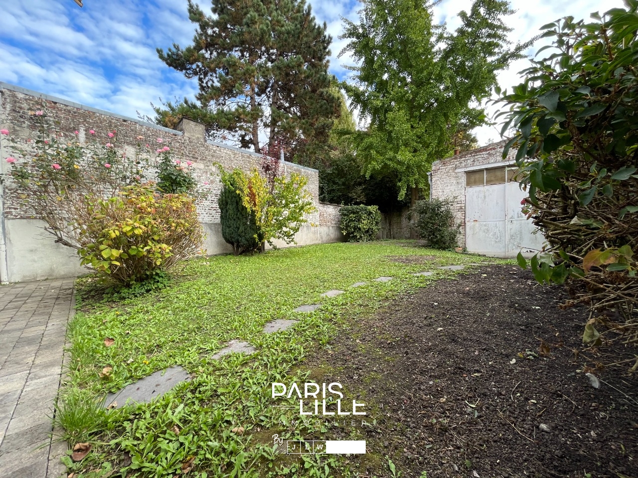 Lomme maison avec jardin Photo 1 - Paris Lille Immobilier