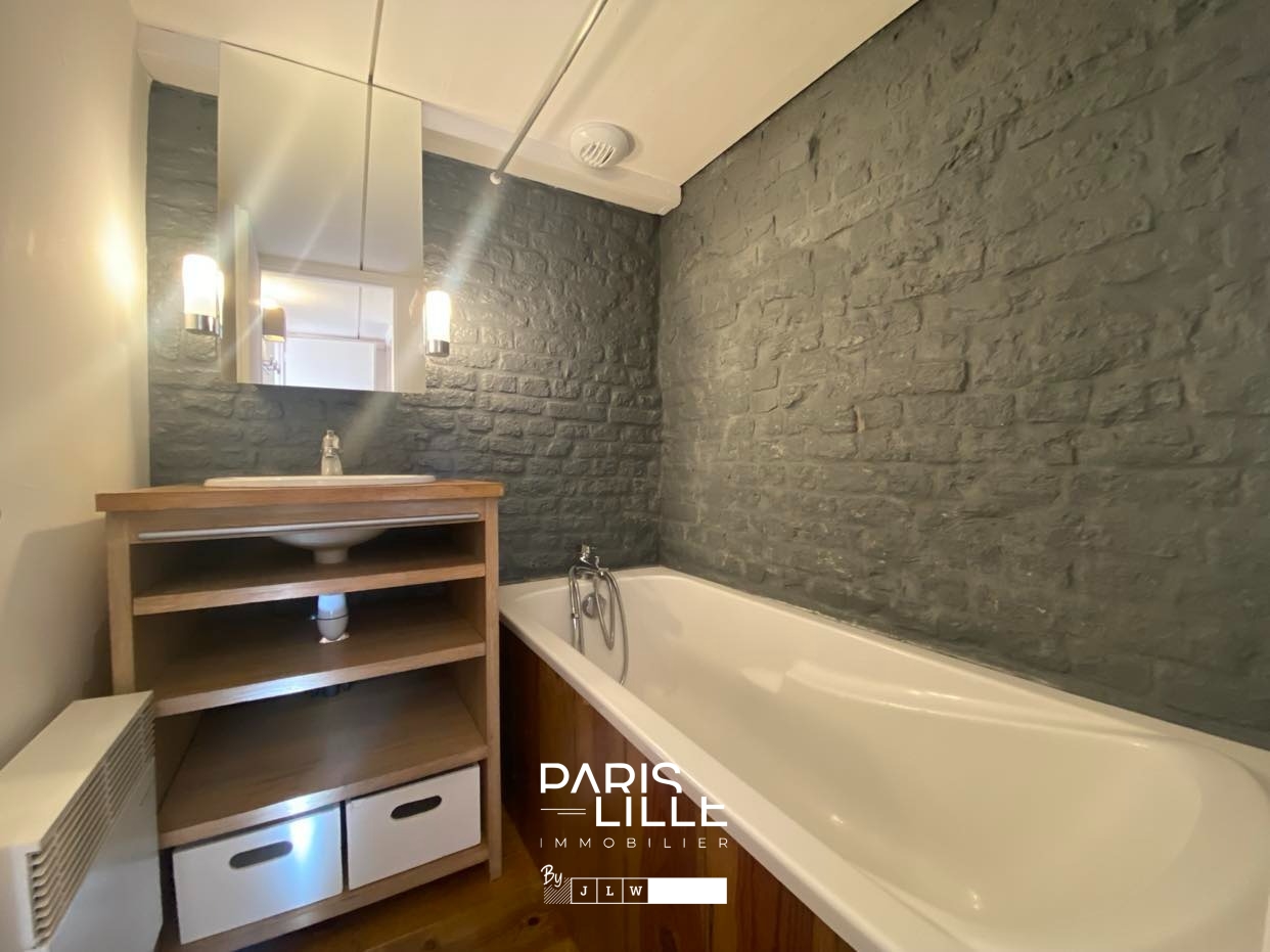Joli type 1 bis 49m2 rue royale Photo 5 - Paris Lille Immobilier