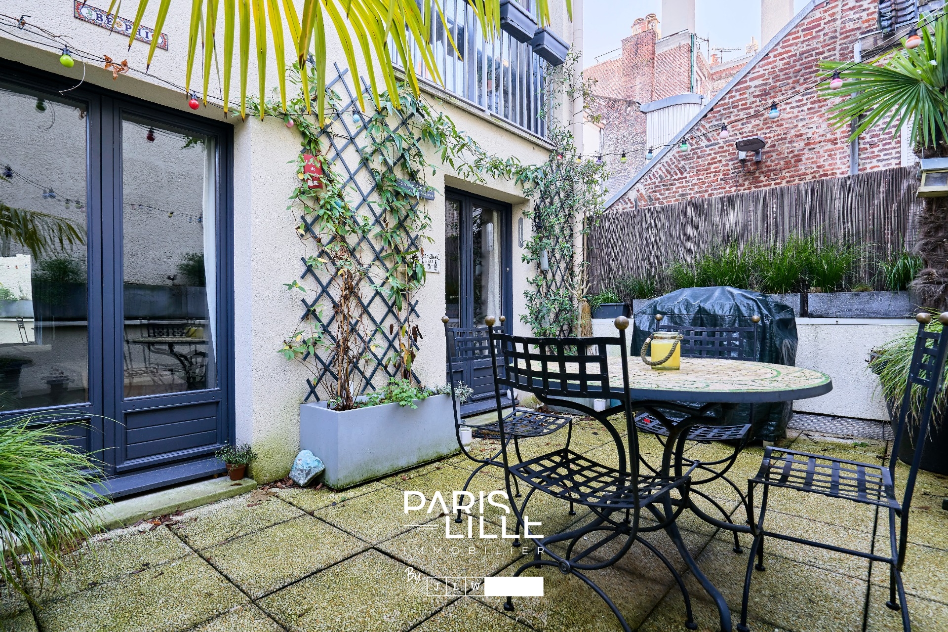 Appartement 2 chambres et terrasse Photo 1 - Paris Lille Immobilier