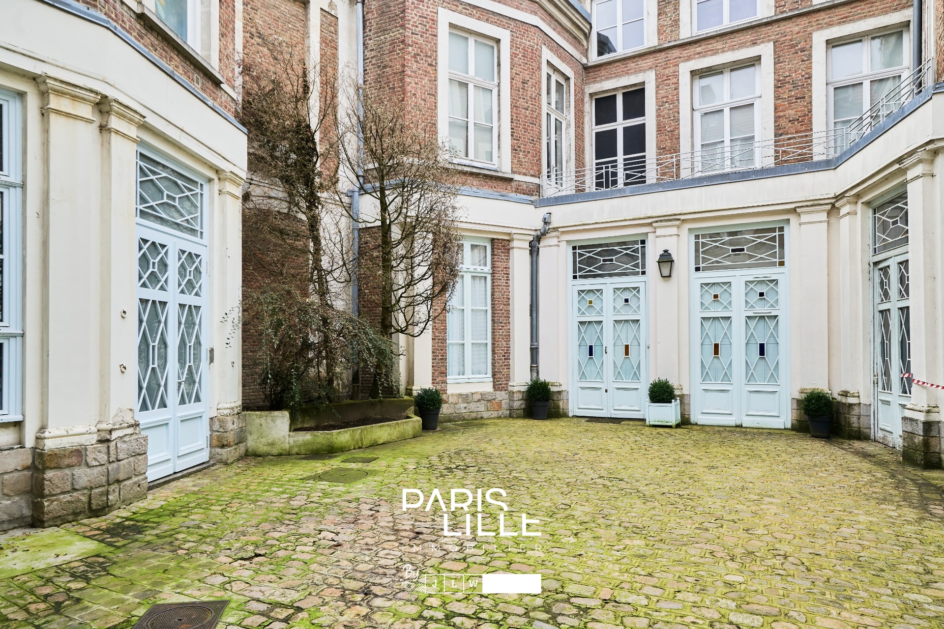 Appartement coup de coeur dans un ancien hotel particulier Photo 2 - Paris Lille Immobilier