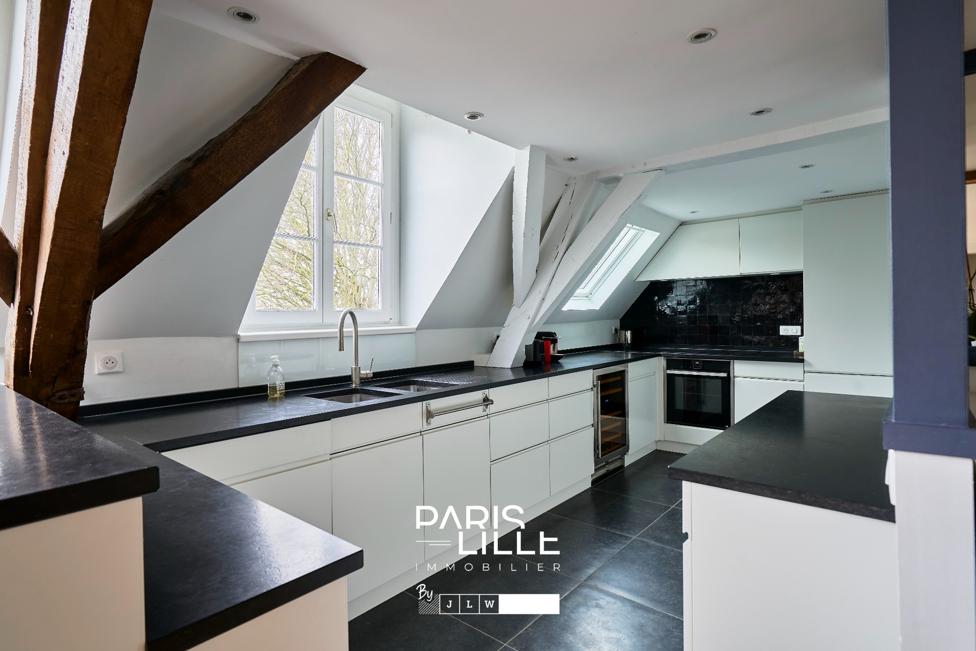 Appartement coup de coeur dans un ancien hotel particulier Photo 5 - Paris Lille Immobilier