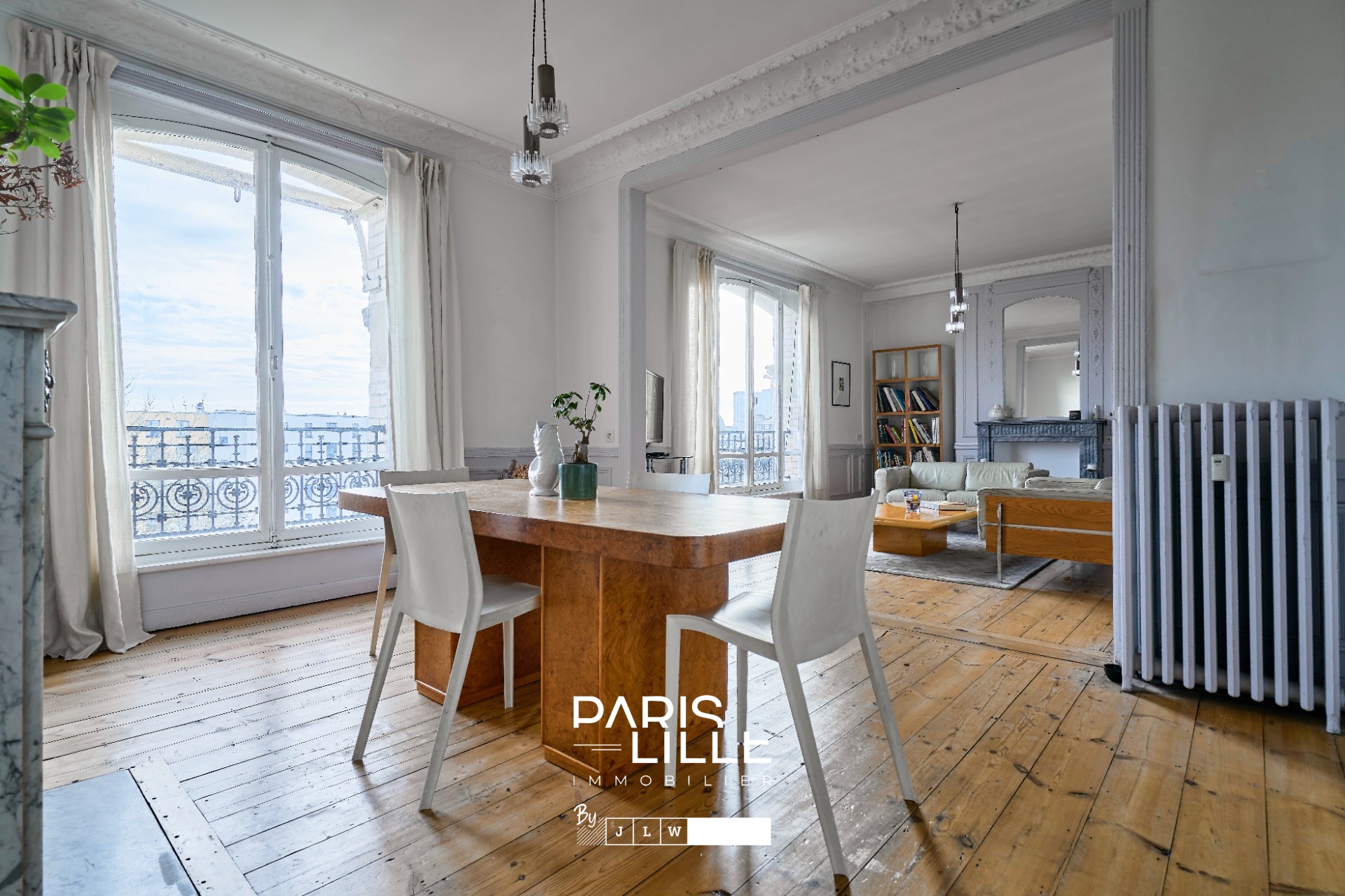 Appartement haussmannien dernier etage parking possible  Photo 1 - Paris Lille Immobilier