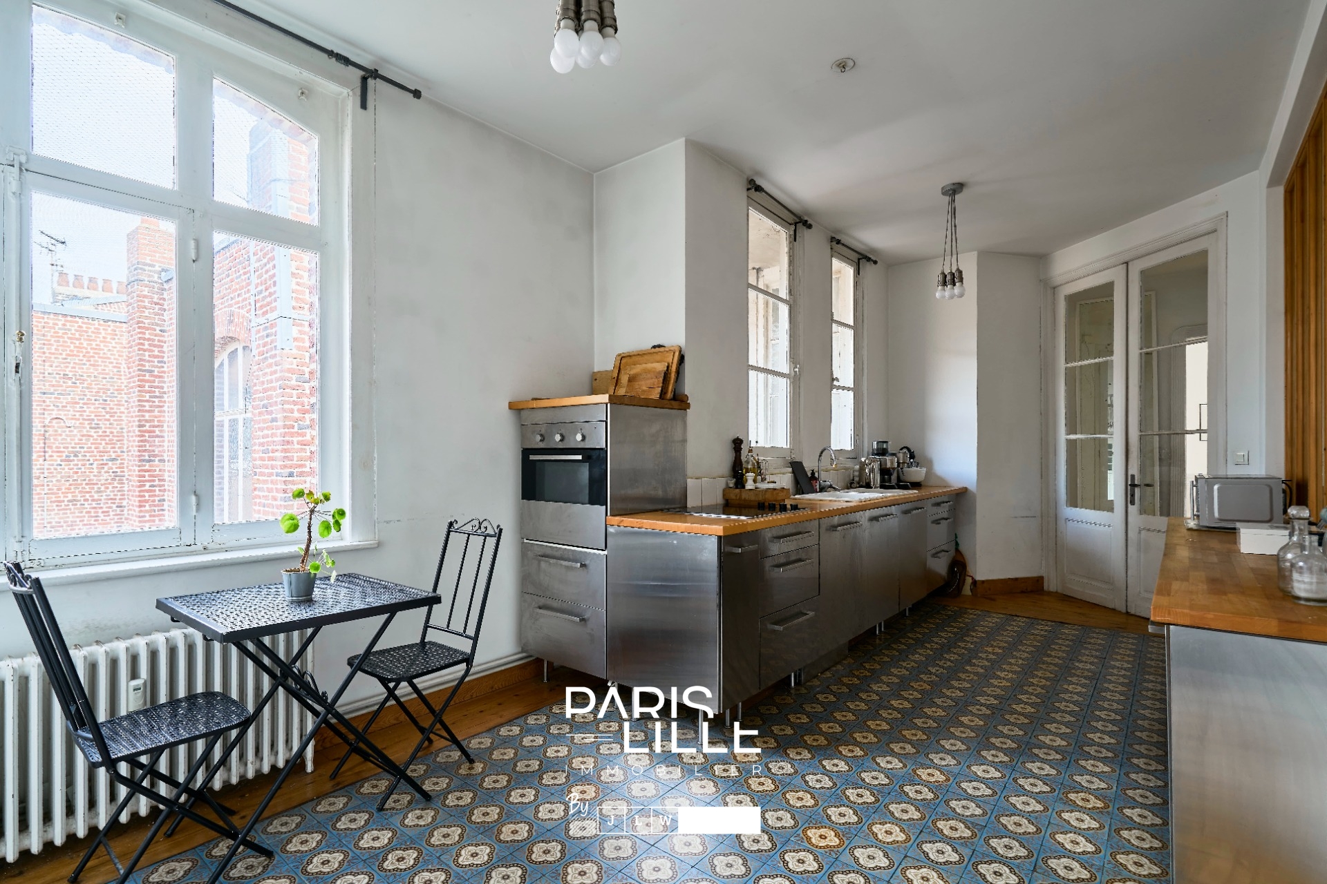Appartement haussmannien dernier etage parking possible  Photo 6 - Paris Lille Immobilier