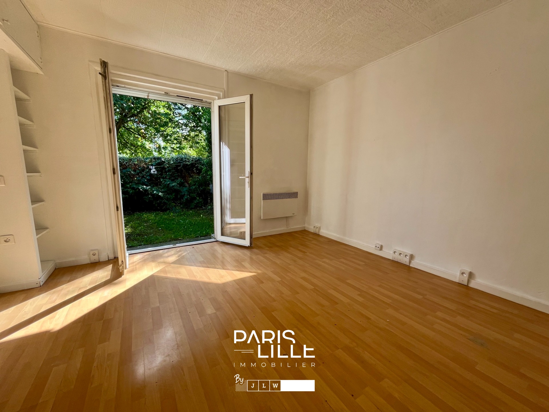 Lille fives  appartement de 25m avec jardin Photo 2 - Paris Lille Immobilier