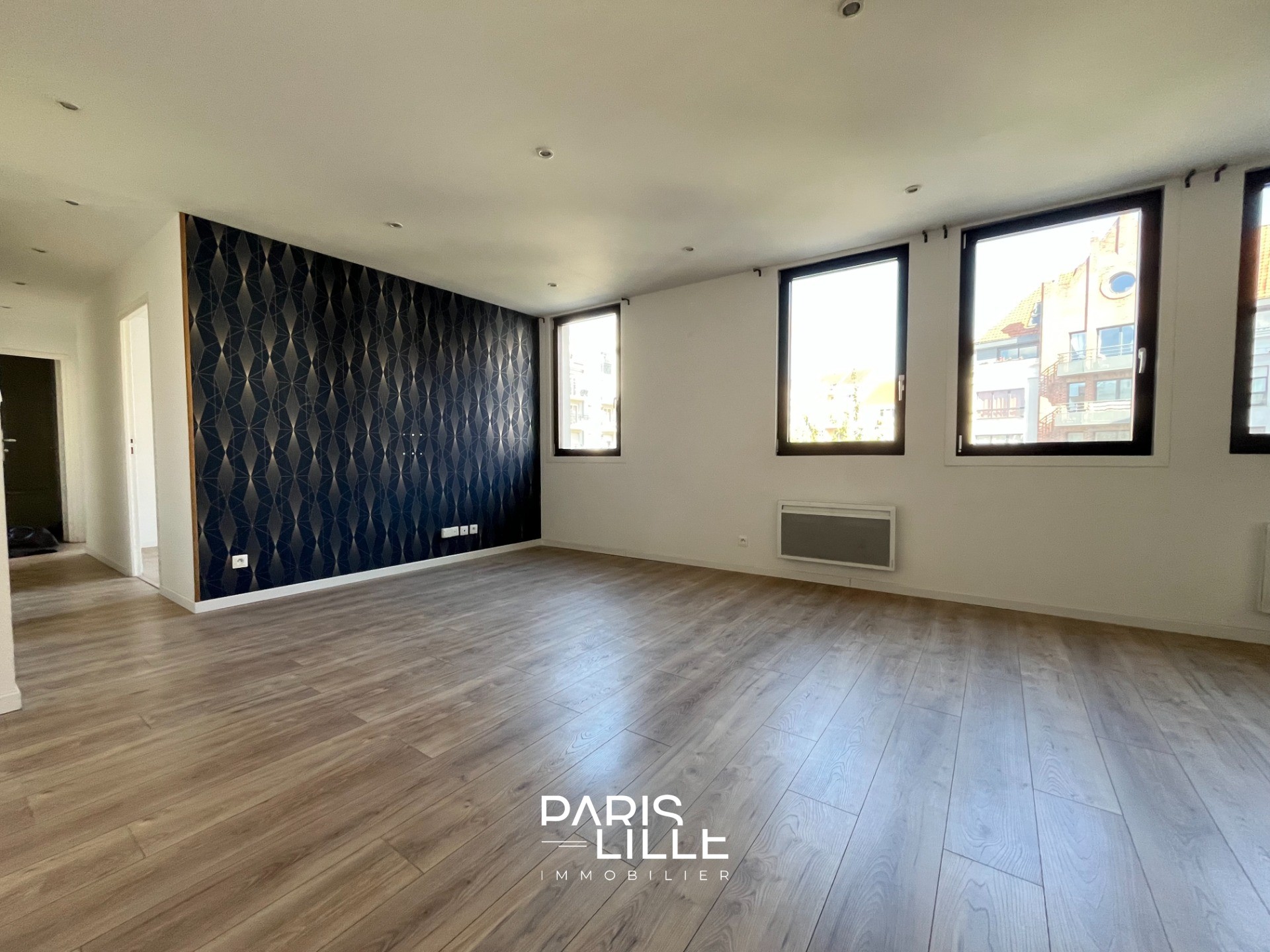 Appartement renove avec cave et parking Photo 3 - Paris Lille Immobilier