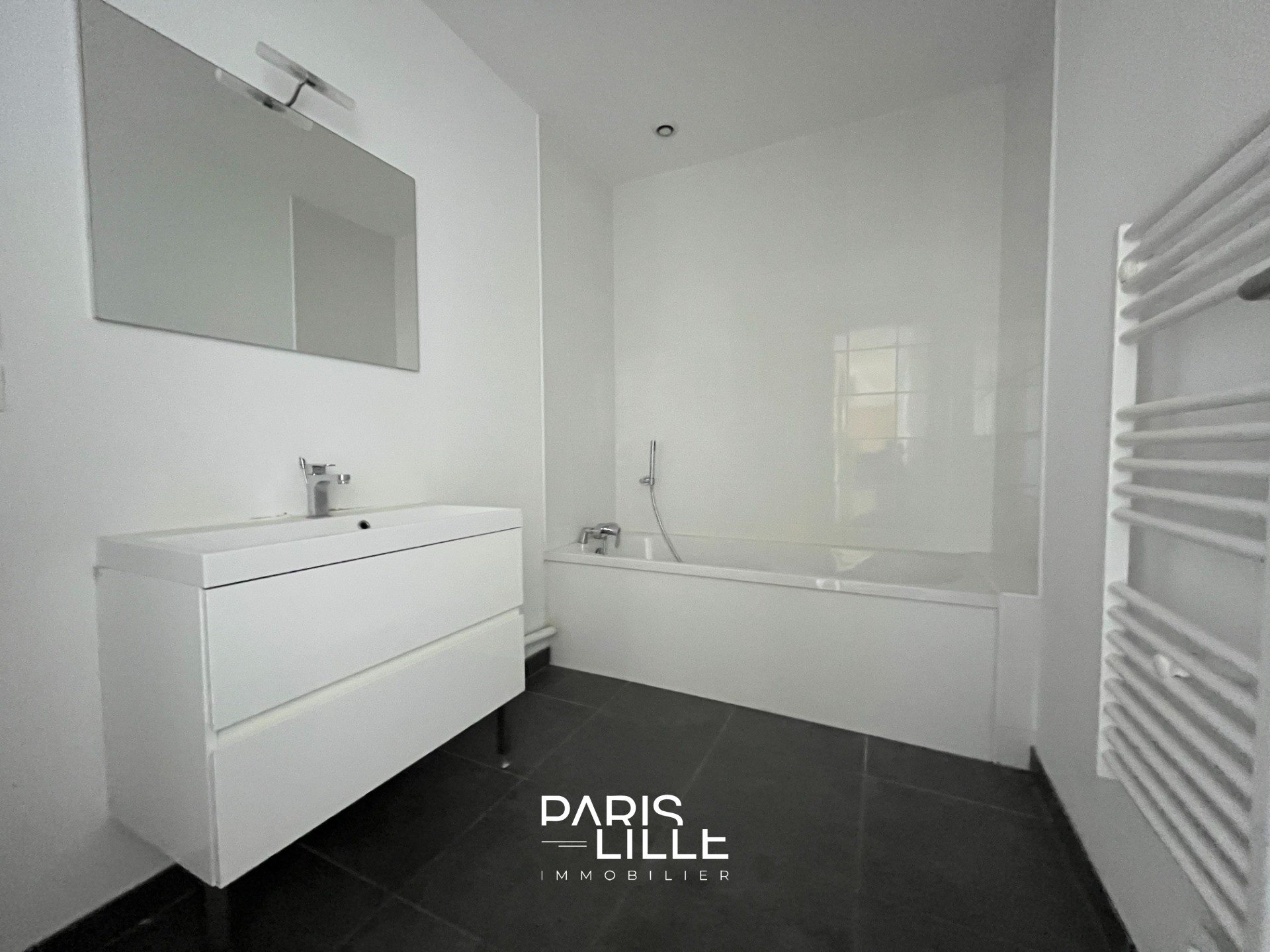 Appartement renove avec cave et parking Photo 7 - Paris Lille Immobilier