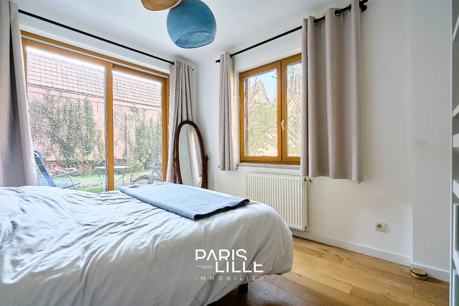 Superbe appartement avec jardin et garage Photo 5 - Paris Lille Immobilier Superbe appartement avec jardin et garage Photo 5 - Paris Lille Immobilier