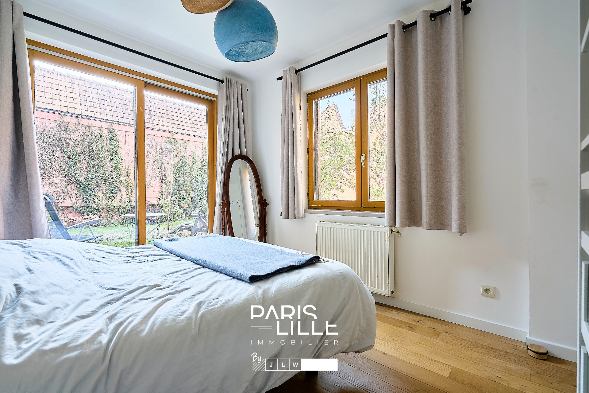 Superbe appartement avec jardin et garage Photo 6 - Paris Lille Immobilier Superbe appartement avec jardin et garage Photo 6 - Paris Lille Immobilier