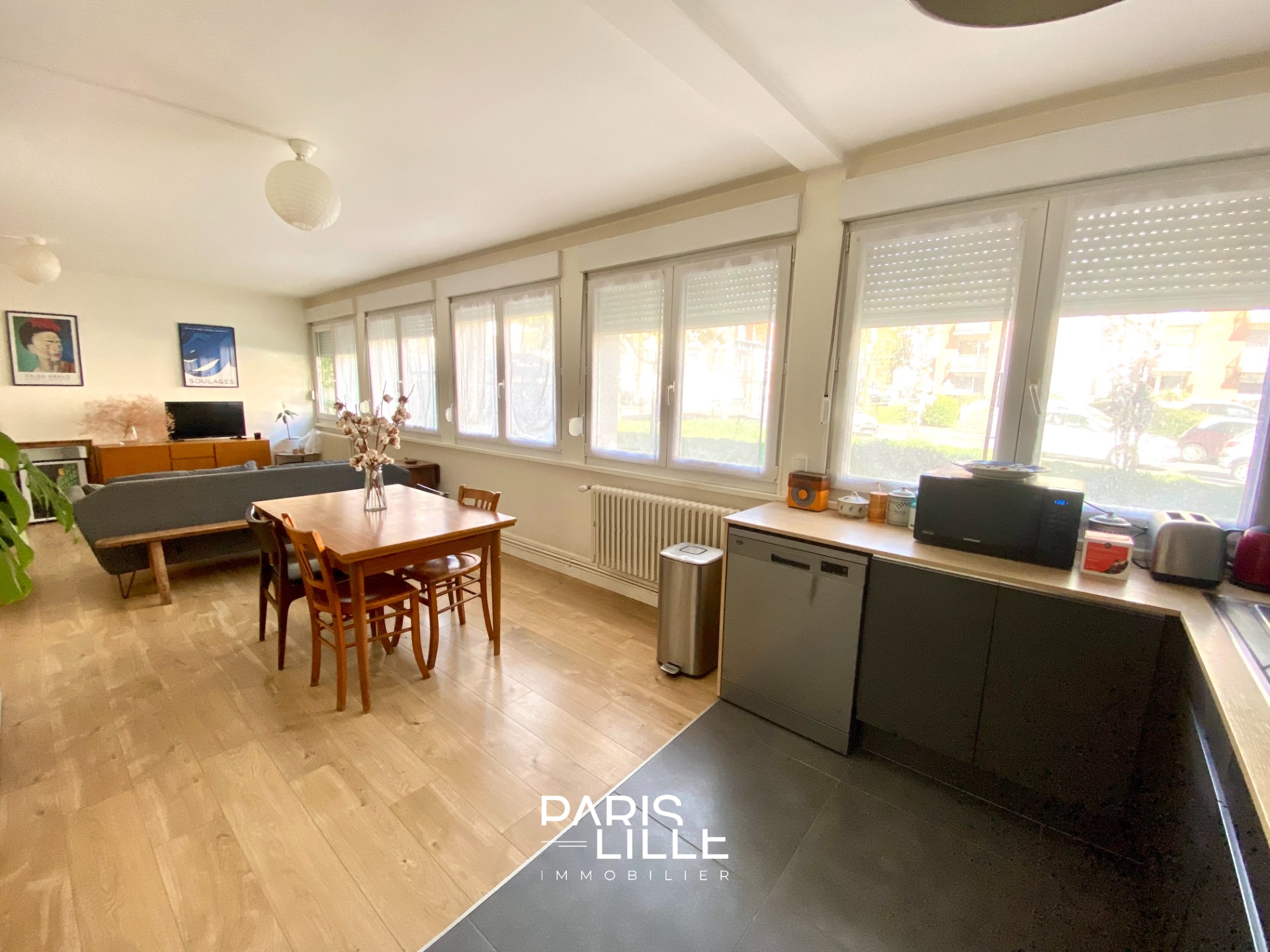 Appartement trois chambres avec jardin commun  Photo 1 - Paris Lille Immobilier