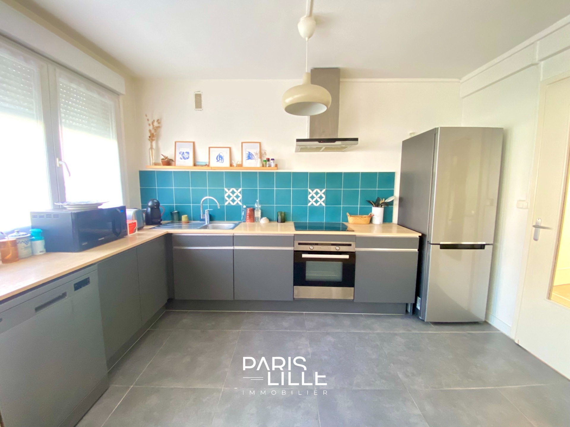 Appartement trois chambres avec jardin commun  Photo 5 - Paris Lille Immobilier