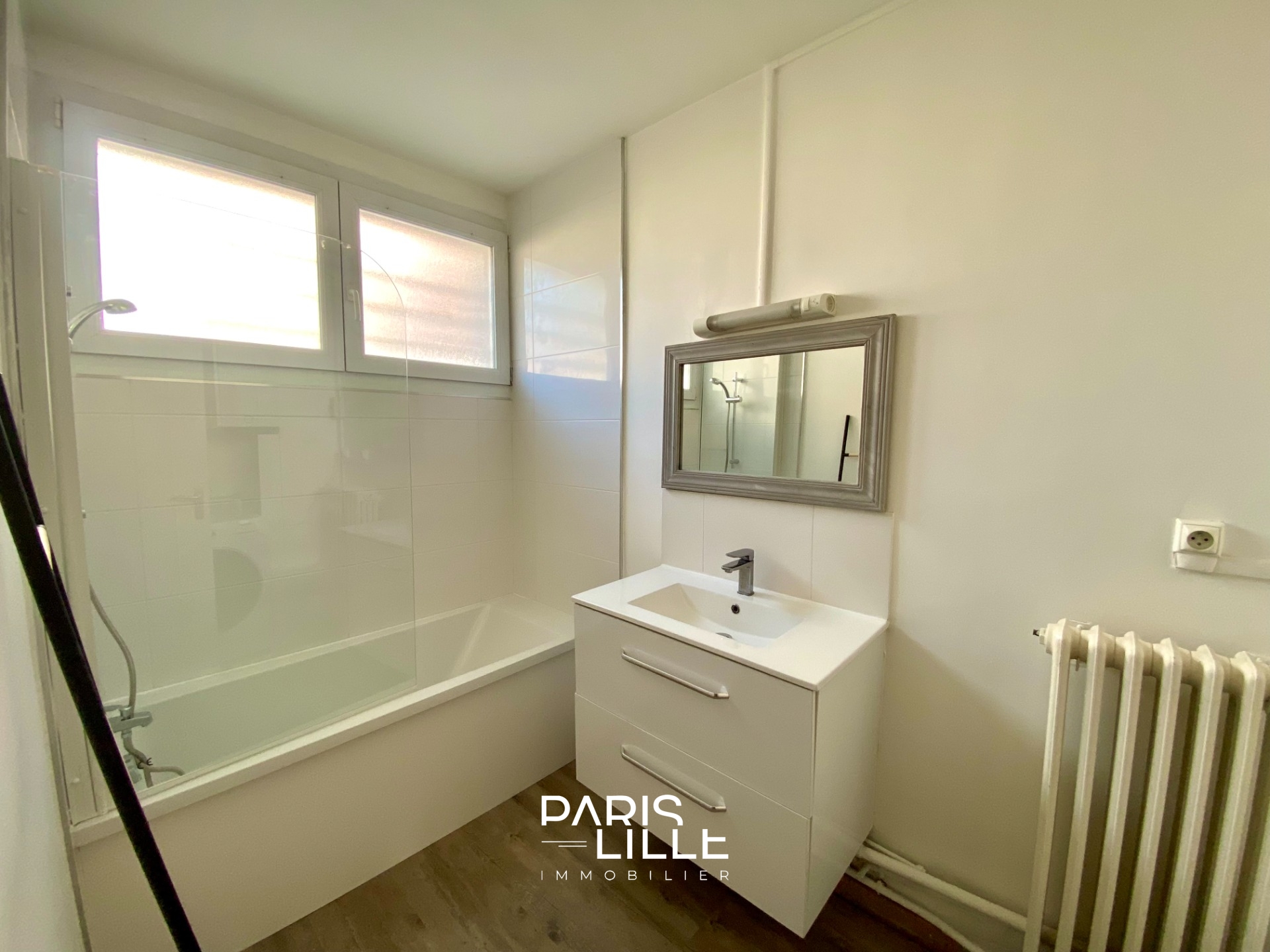 Appartement trois chambres avec jardin commun  Photo 9 - Paris Lille Immobilier