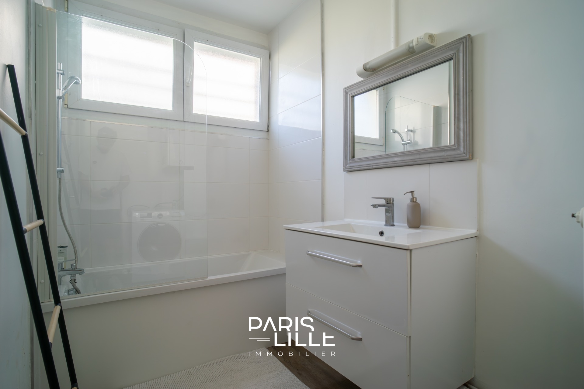 Appartement trois chambres avec jardin commun Photo 9 - Paris Lille Immobilier Appartement trois chambres avec jardin commun Photo 9 - Paris Lille Immobilier