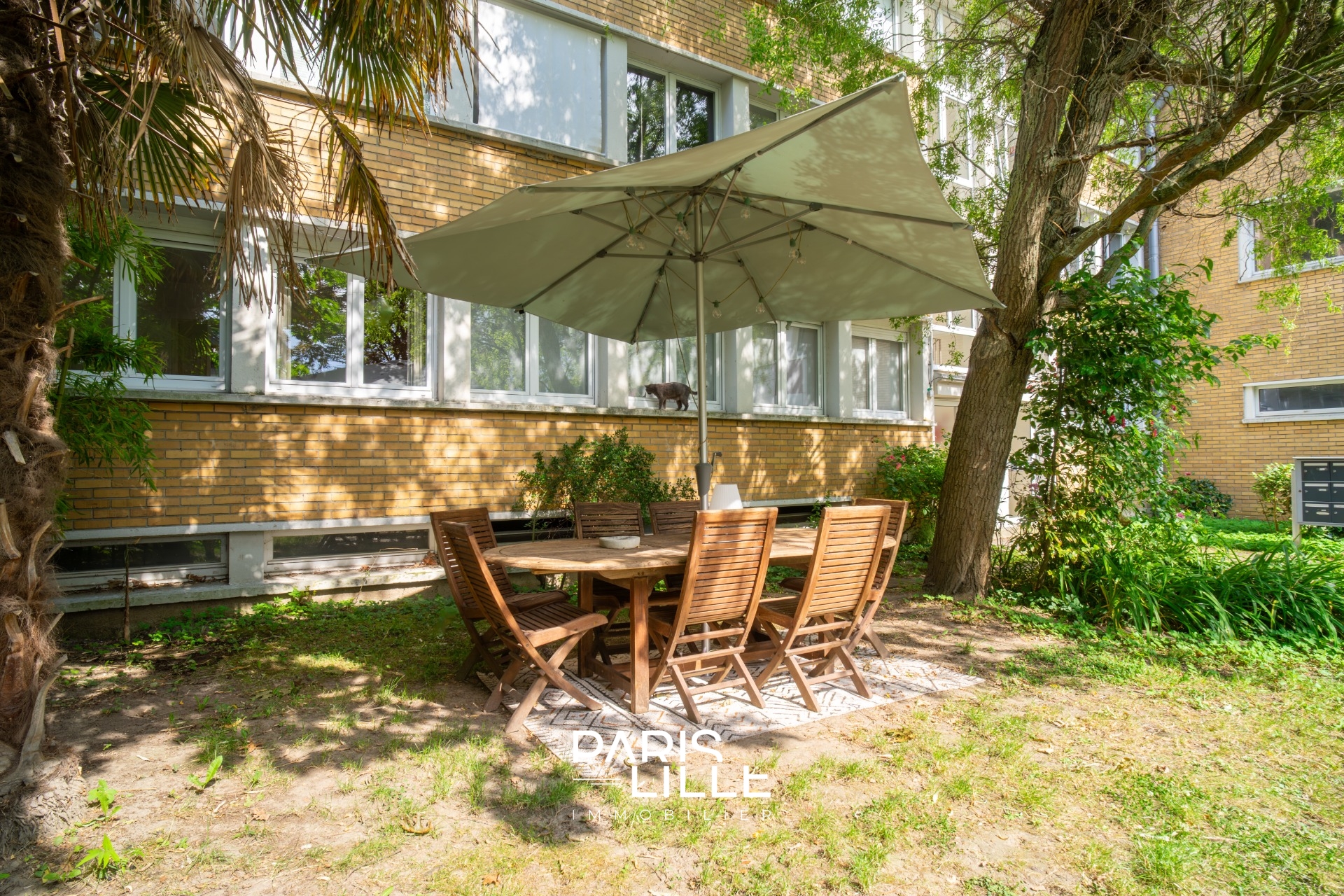 Appartement trois chambres avec jardin commun Photo 11 - Paris Lille Immobilier Appartement trois chambres avec jardin commun Photo 11 - Paris Lille Immobilier