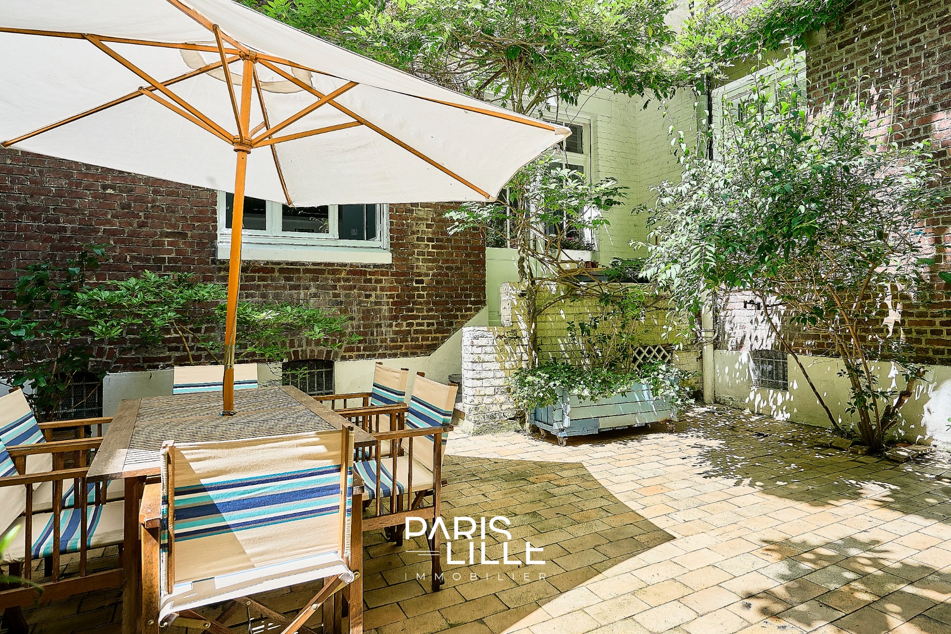 Superbe appartement 130 m quatre chambres et terrasse Photo 3 - Paris Lille Immobilier