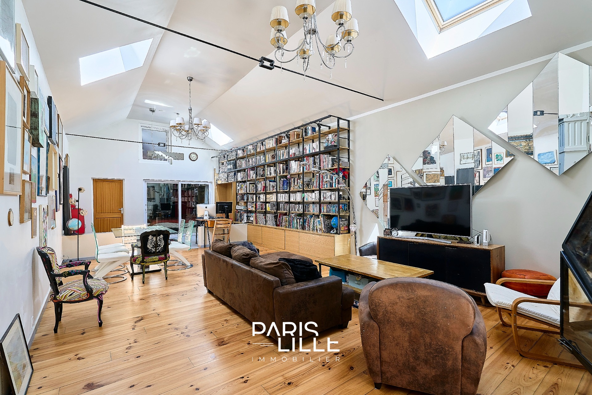 Appartement esprit loft avec garage et studio Photo 1 - Paris Lille Immobilier Appartement esprit loft avec garage et studio Photo 1 - Paris Lille Immobilier