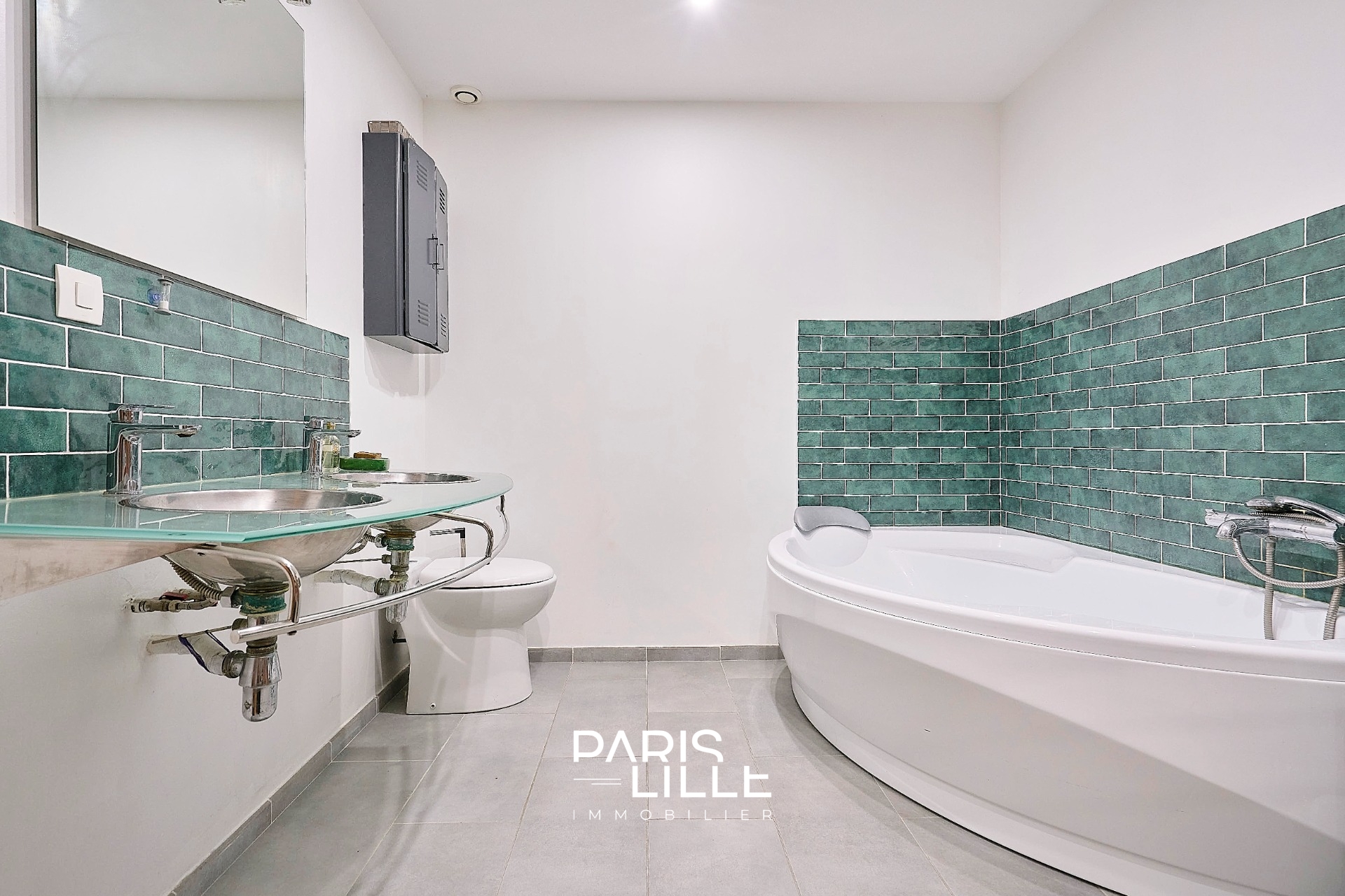 Appartement esprit loft avec garage et studio Photo 14 - Paris Lille Immobilier Appartement esprit loft avec garage et studio Photo 14 - Paris Lille Immobilier