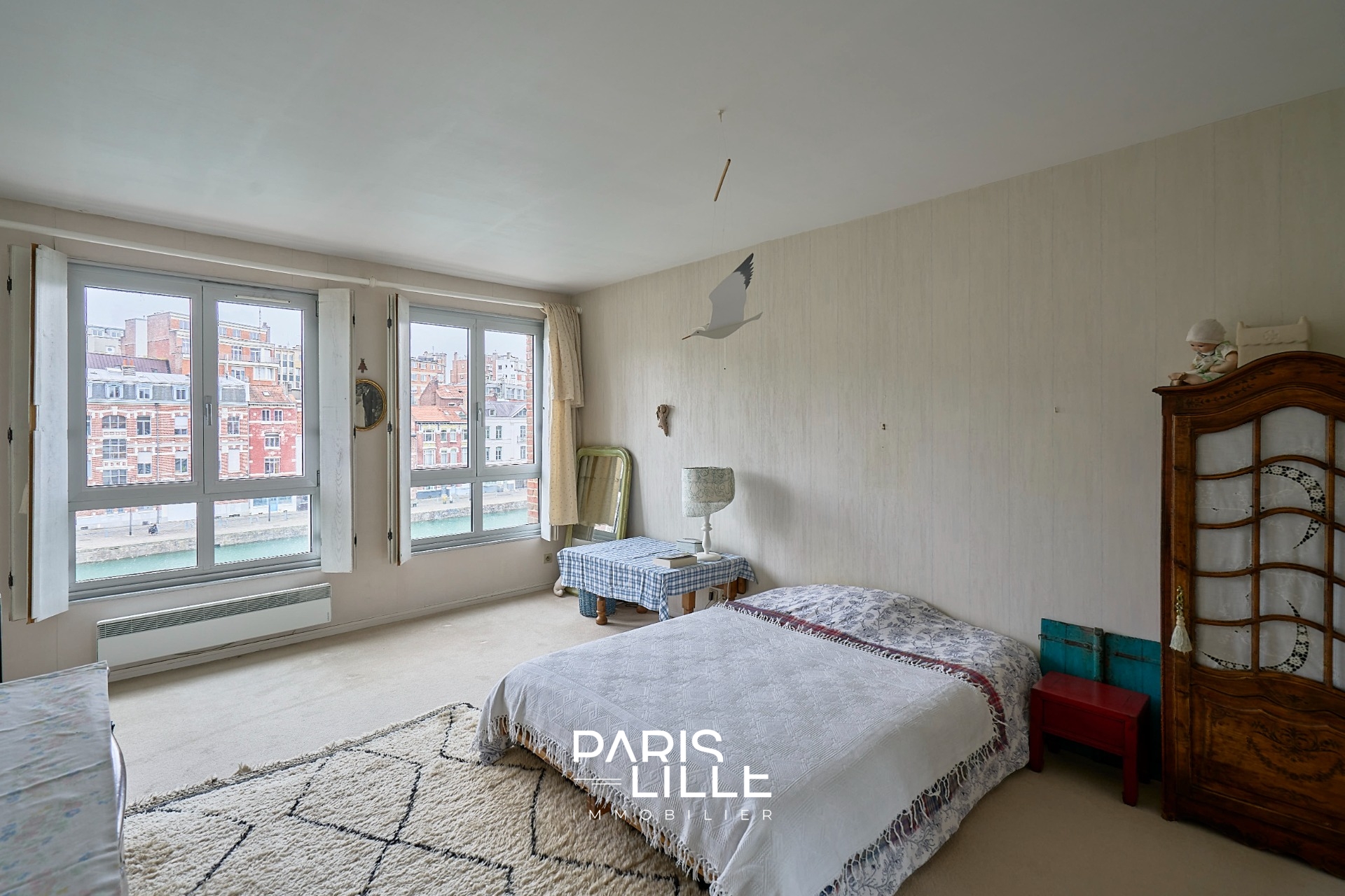 Rare quai du wault duplex balcon et parking garage possible Photo 11 - Paris Lille Immobilier Rare quai du wault duplex balcon et parking garage possible Photo 11 - Paris Lille Immobilier